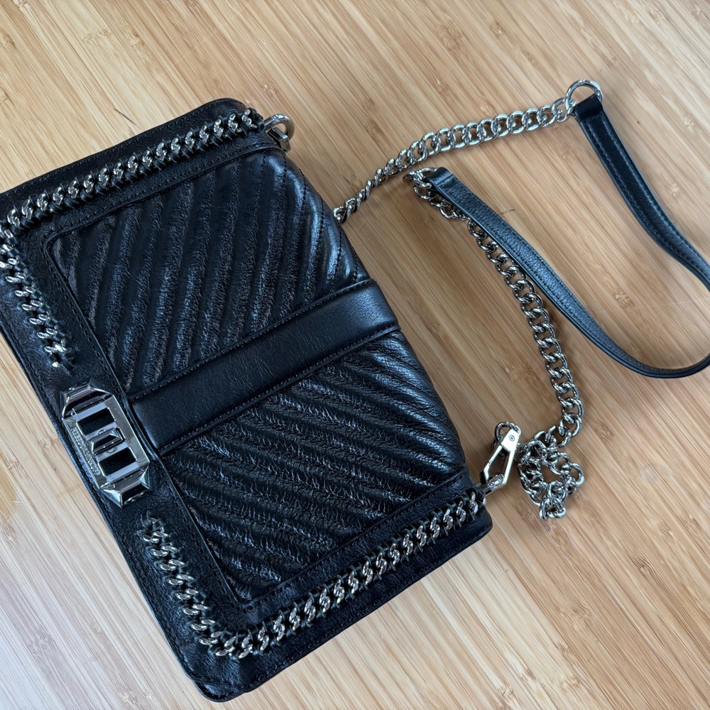 Rebecca Minkoff purse
Brand new with tags and bag 
Never used